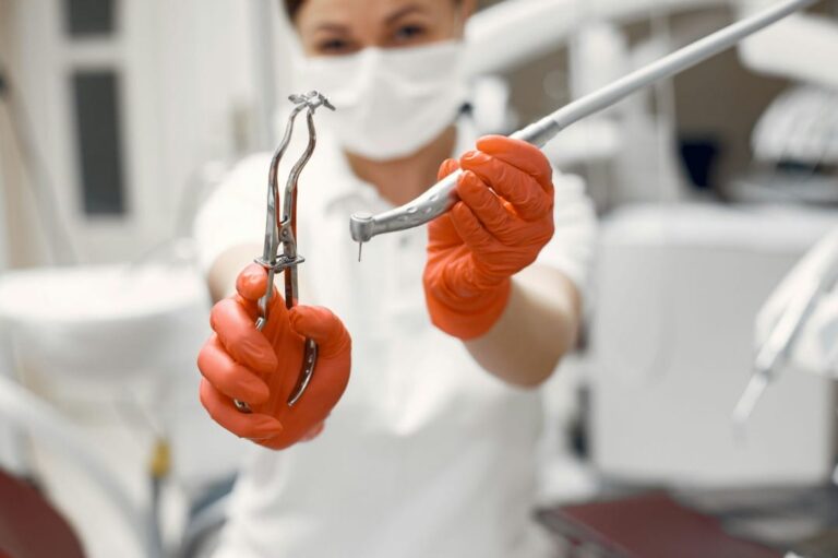 arafed woman in a white shirt and red gloves holding a pair of scissors