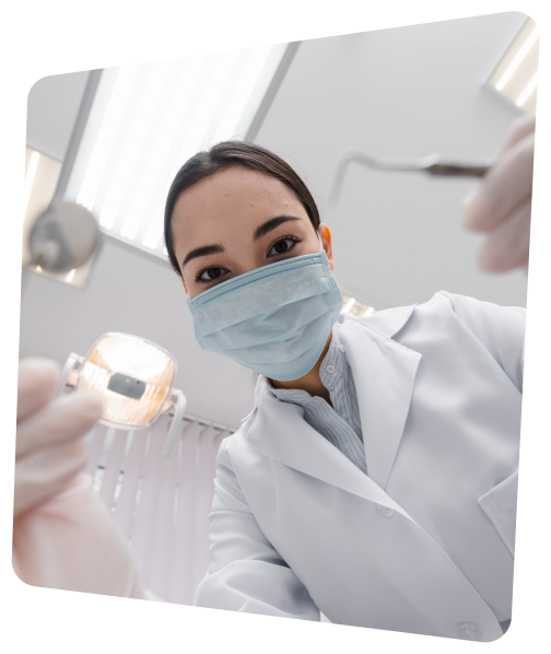 arafed woman in a white lab coat and mask holding a toothbrush