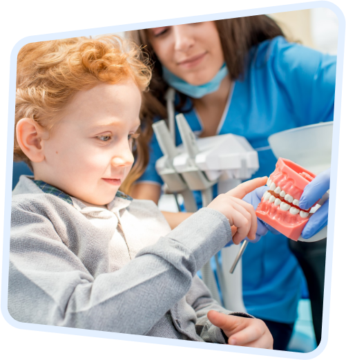 arafed child with a toothbrush and a dentist holding a model of a tooth