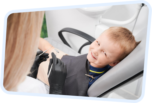 arafed child in a dentist chair getting a check up