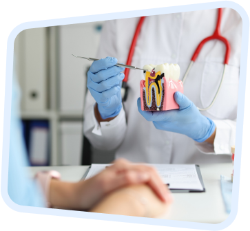 a close up of a person in a white coat and blue gloves holding a toothbrush