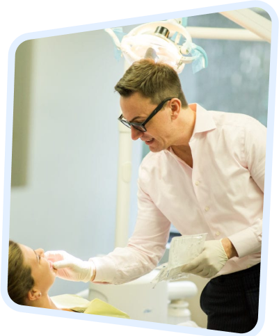 arafed man in a dentist ' s chair with a little girl