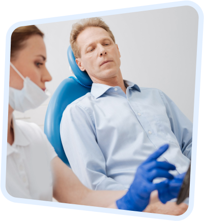 arafed man in a dental chair with a woman in a chair