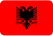 a red background with a black eagle in the middle