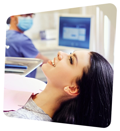 arafed woman in a dental chair with a dentist in the background