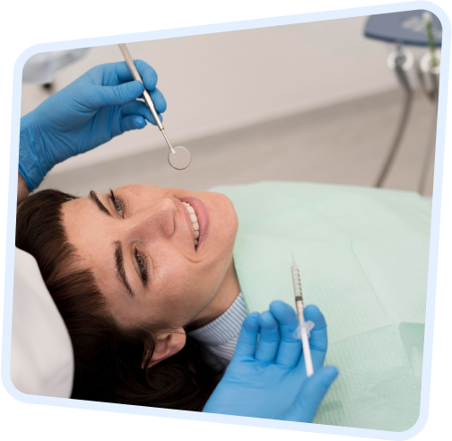 arafed woman getting her teeth examined by a dentist