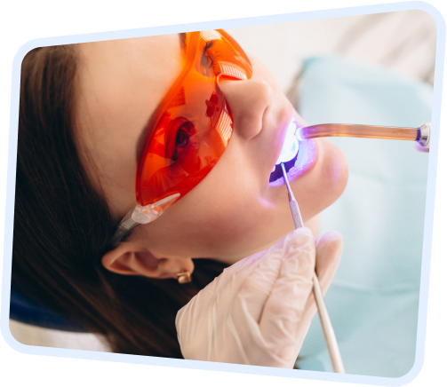 arafed woman getting her teeth examined by a dentist