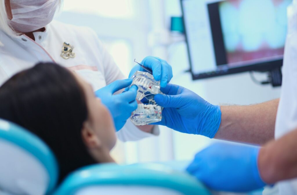 arafed woman getting her teeth examined by a dentist