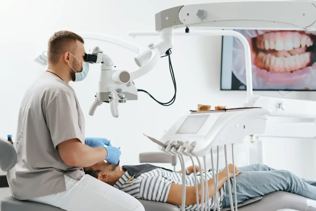 arafed man sitting in a dental chair with a patient